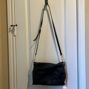 Kate spade crossbody bag with small handle.